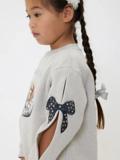 Abito felpa lurex con fiocchi