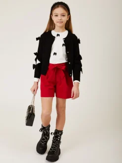 Cardigan con fiocchi applicati