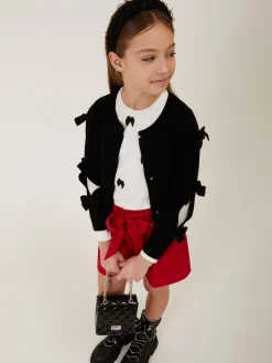 Cardigan con fiocchi applicati