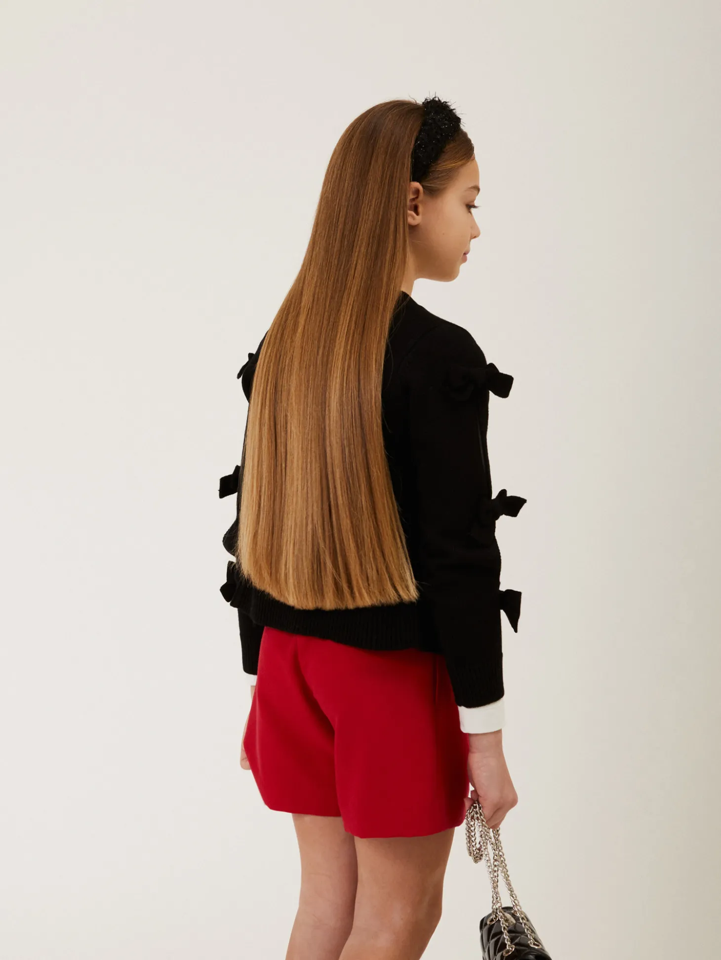 Cardigan con fiocchi applicati
