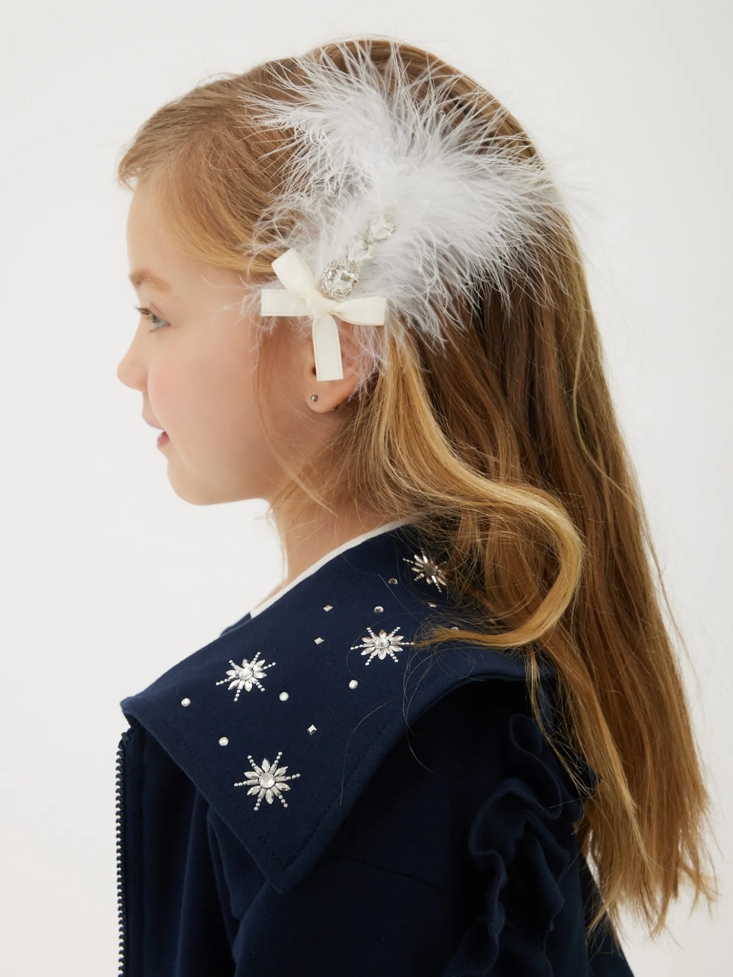 Fermagli capelli piume e strass