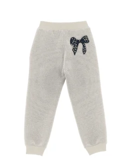 Jogger felpa glitter con fiocco