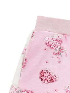 Shorts felpa con fiori